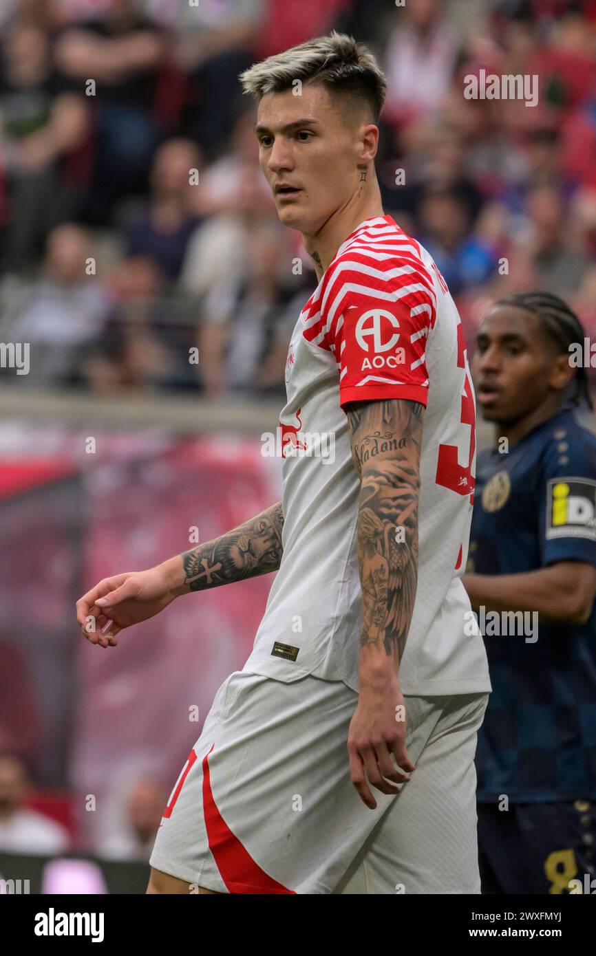 Lipsia, Germania. 30 marzo 2024. Benjamin Sesko (RasenBallsport Leipzig, #30), RB Leipzig vs Mainz 05, 1st Bundesliga, Soccer, DFB, Bundesliga, stagione 2023/2024, red bull arena di lipsia, 30.03. 2024, credito: HMB Media/Uwe Koch/Alamy Live News , Foto Stock