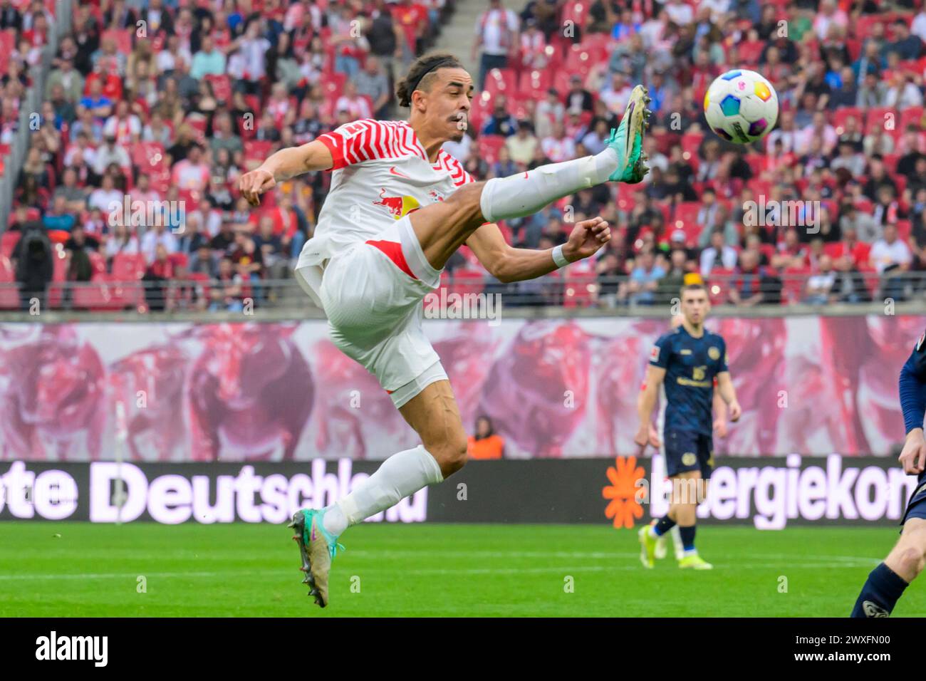 Lipsia, Germania. 30 marzo 2024. Yussuf Poulsen (RasenBallsport Leipzig, #09), gioca la palla, RB Leipzig vs Mainz 05, 1a Bundesliga, calcio, DFB, Bundesliga, stagione 2023/2024, red bull arena di lipsia, 30.03. 2024, credito: HMB Media/Uwe Koch/Alamy Live News , Foto Stock