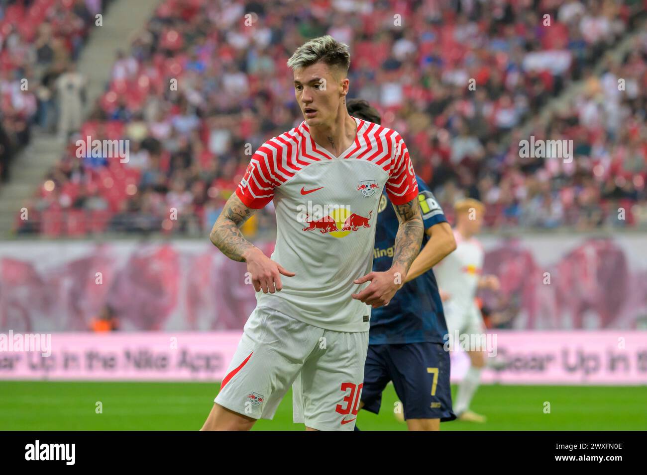 Lipsia, Germania. 30 marzo 2024. Benjamin Sesko (RasenBallsport Leipzig, #30), RB Leipzig vs Mainz 05, 1st Bundesliga, Soccer, DFB, Bundesliga, stagione 2023/2024, red bull arena di lipsia, 30.03. 2024, credito: HMB Media/Uwe Koch/Alamy Live News , Foto Stock