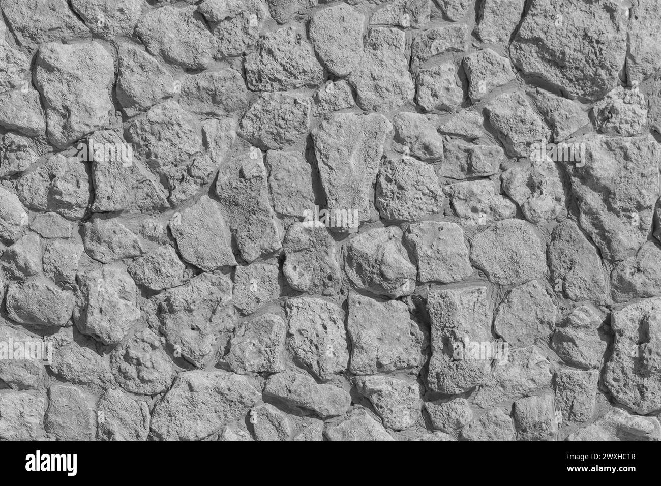 Grigio grigio grigio ruvido struttura muraria in pietra solida motivo astratto sfondo pavimento. Foto Stock