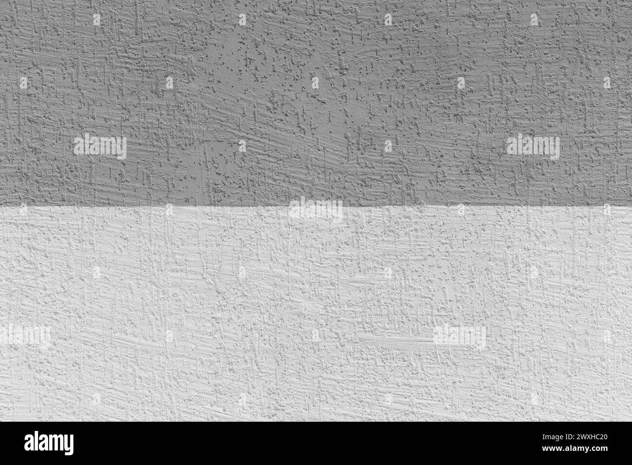 Parete due colori Grigio bianco disegno astratto spazio vuoto testo sfondo vuoto trama campione sfondo grigio. Foto Stock