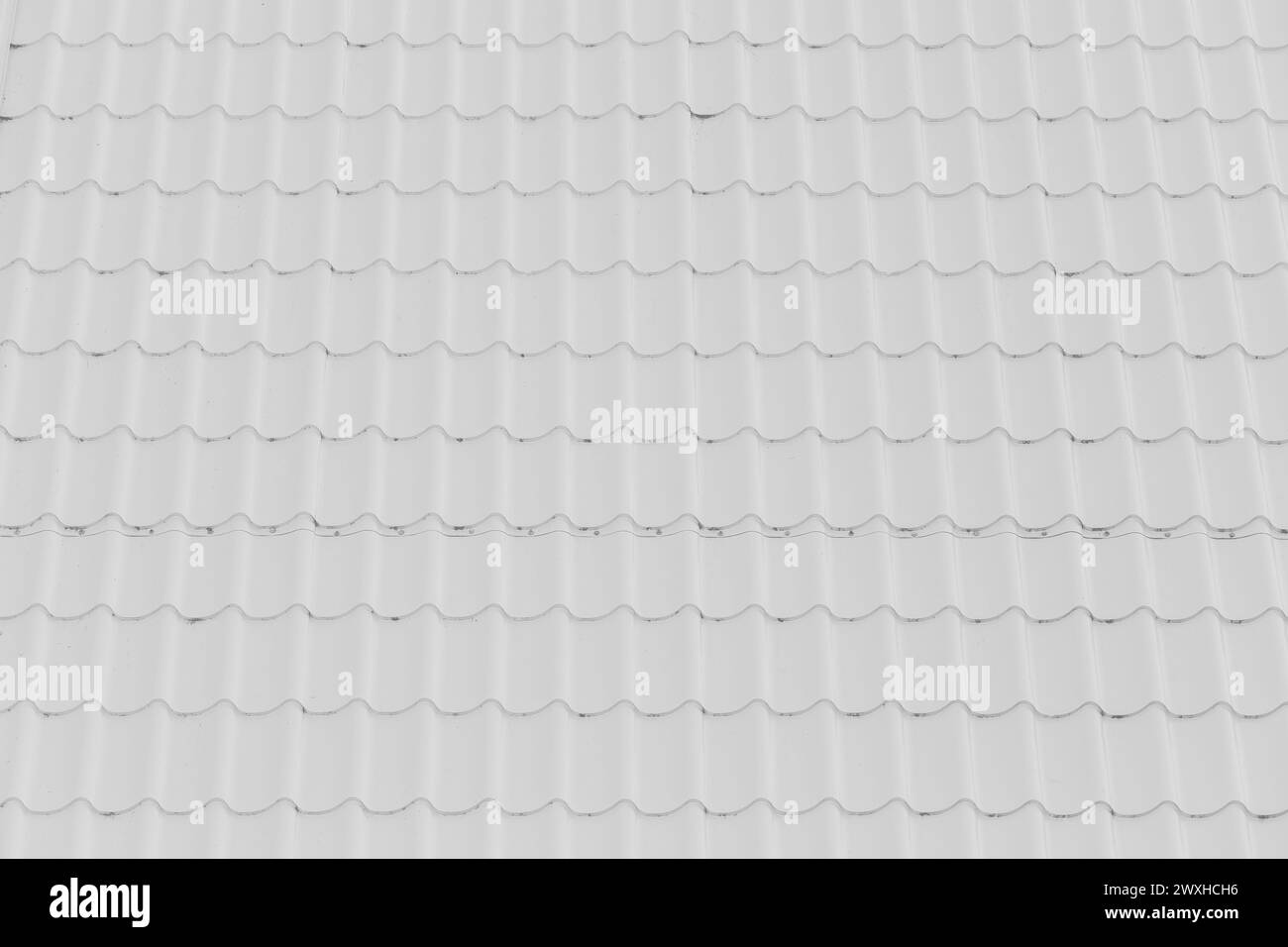 Rivestimento tetto piastrelle bianche Mosaico superficie camera motivo astratto struttura luce Casa sfondo struttura luce. Foto Stock