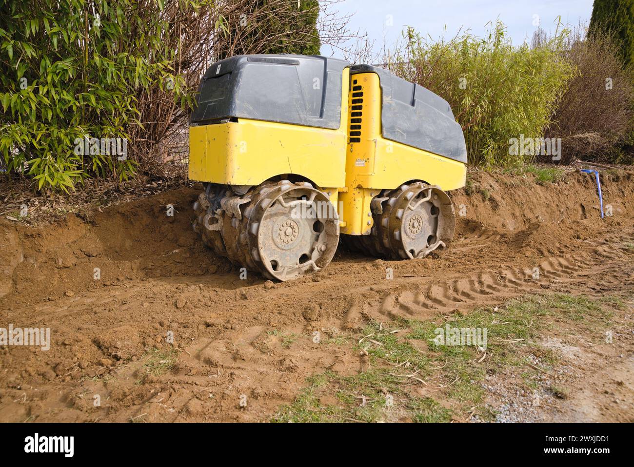 Rullo di trincea per macchine edili per la compattazione - compattatore multiuso Foto Stock