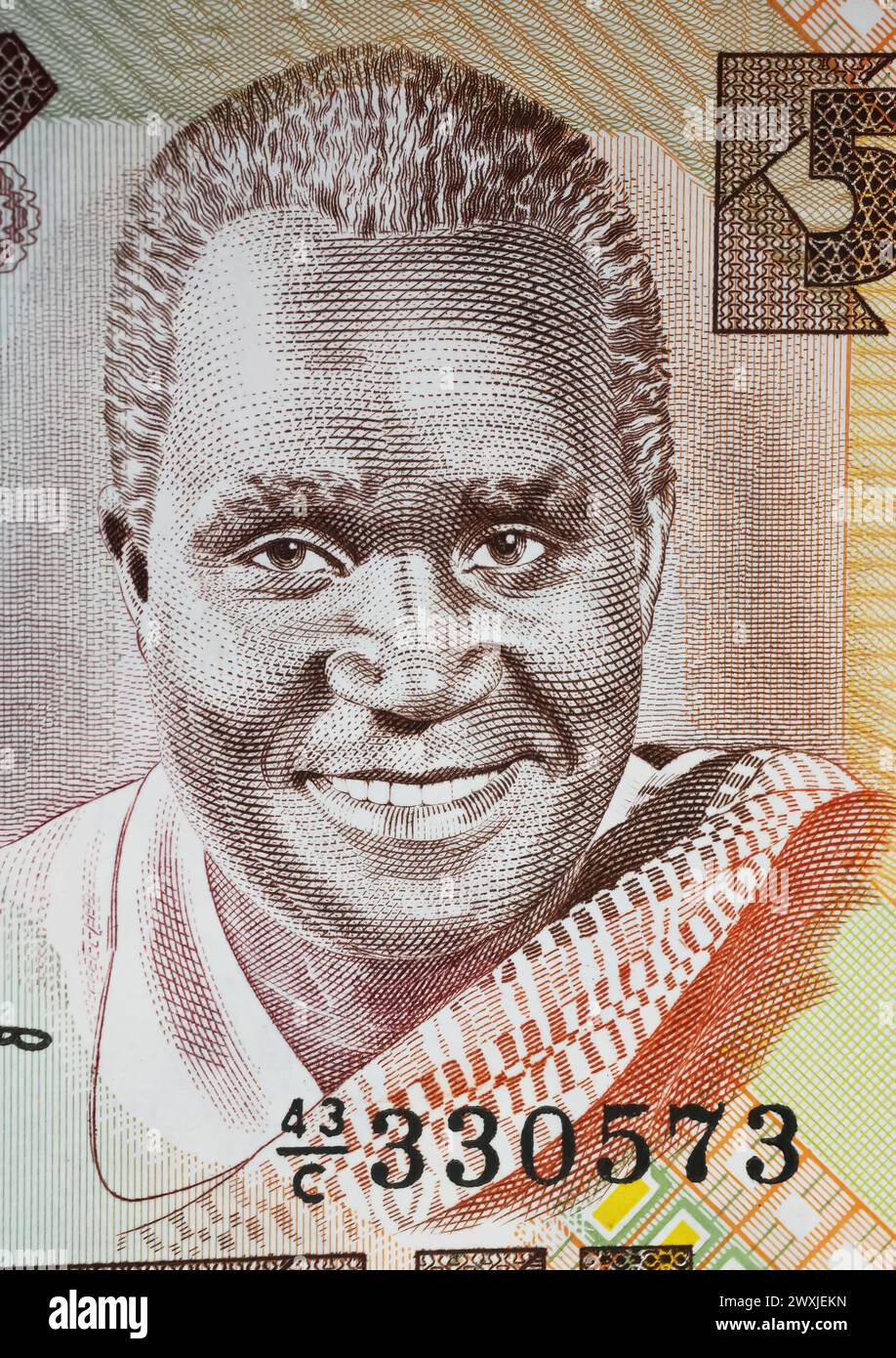Ritratto dell'ex presidente Kenneth Kaunda sulla banconota in valuta Zambia da 5 Kwacha (focalizzazione sul centro) Foto Stock