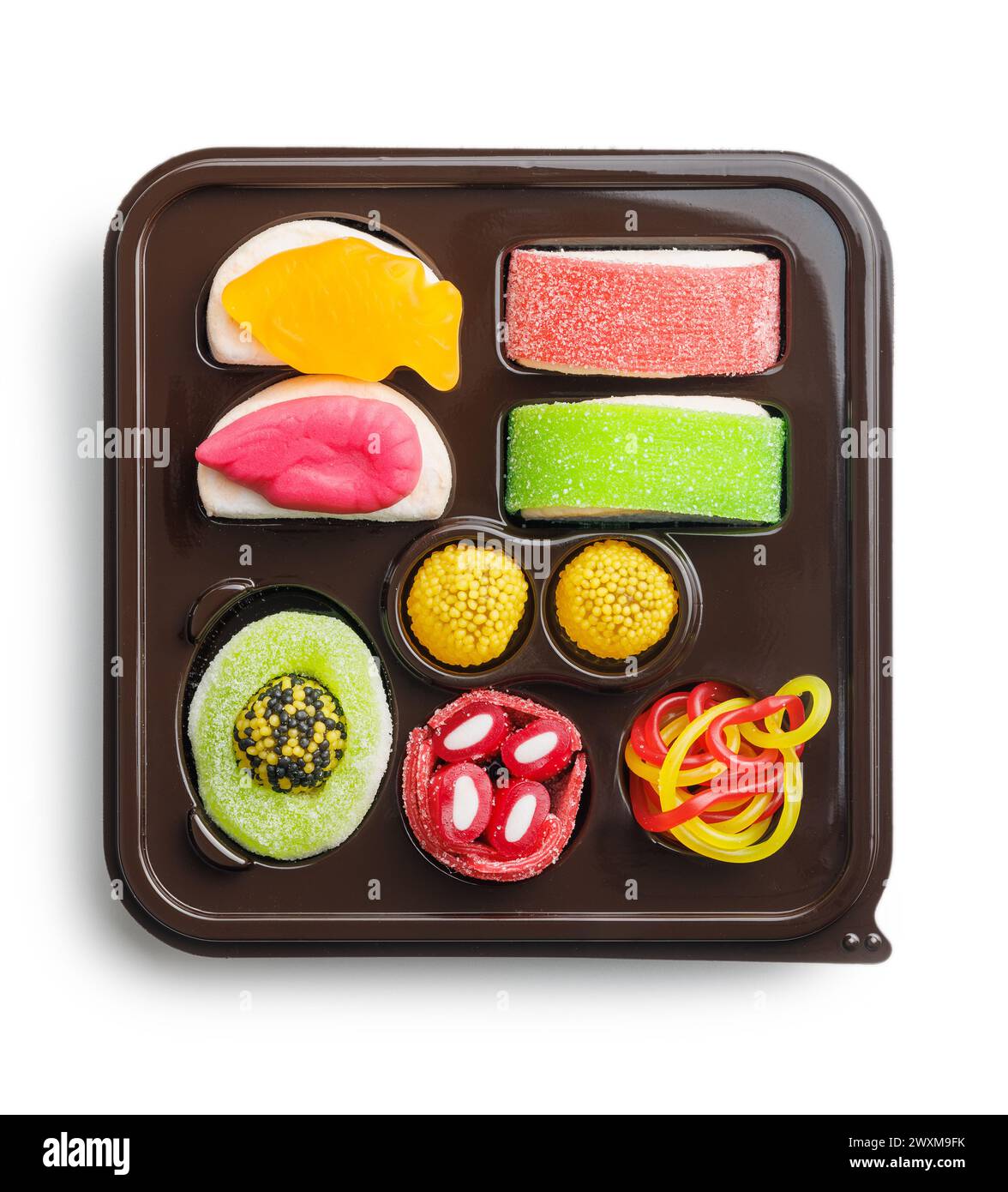 Dolci caramelle sushi isolate su sfondo bianco. Foto Stock
