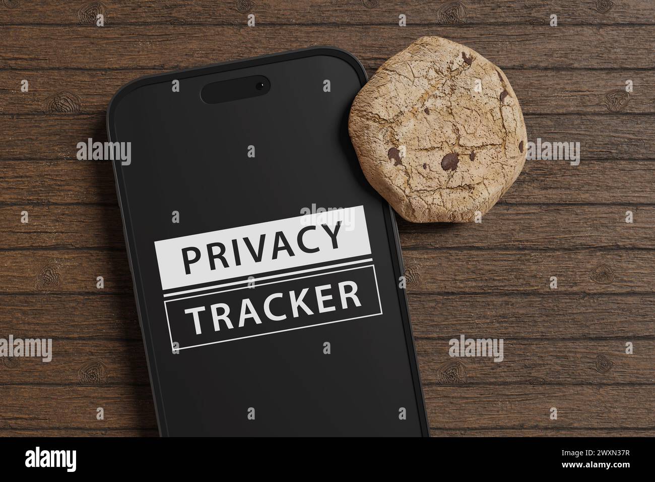 Cookie appoggiato su un telefono cellulare che mostra le parole PRIVACY TRACKER su una scrivania di legno. Impronta digitale e conformità al GDPR Foto Stock