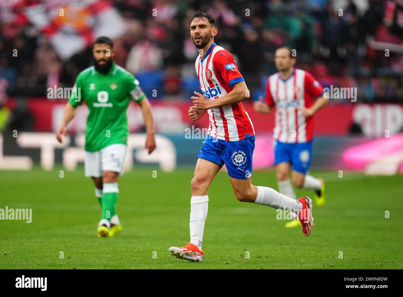 Ivan Martin del Girona FC durante la partita della Liga EA Sports tra il Girona FC e il Real Betis giocata al Montilivi Stadium il 31 marzo 2024 a Girona, in Spagna. (Foto di Bagu Blanco / PRESSINPHOTO) Foto Stock