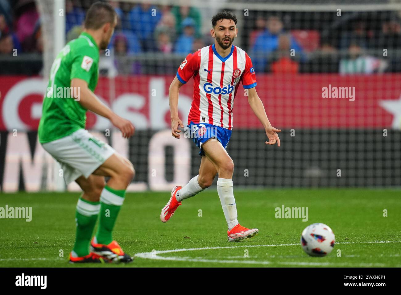 Ivan Martin del Girona FC durante la partita della Liga EA Sports tra il Girona FC e il Real Betis giocata al Montilivi Stadium il 31 marzo 2024 a Girona, in Spagna. (Foto di Bagu Blanco / PRESSINPHOTO) Foto Stock