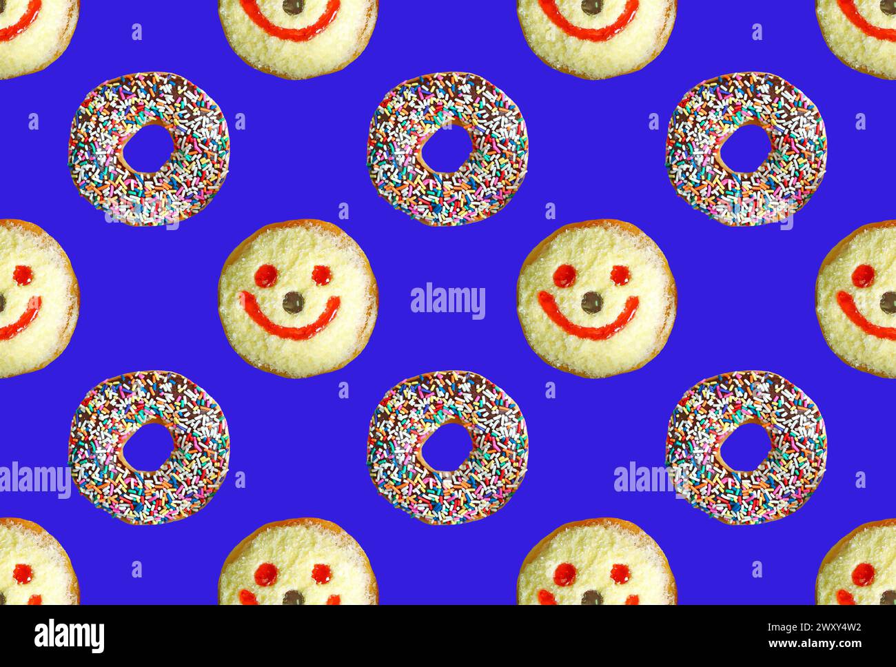 Ciambelle glassate al cioccolato con faccia sorridente Coconut Flakes pattern di ciambelle su sfondo blu Foto Stock