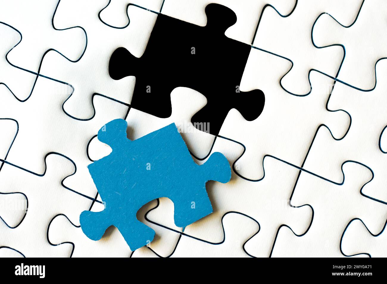 puzzle con sega a maschera con un pezzo mancante Foto Stock