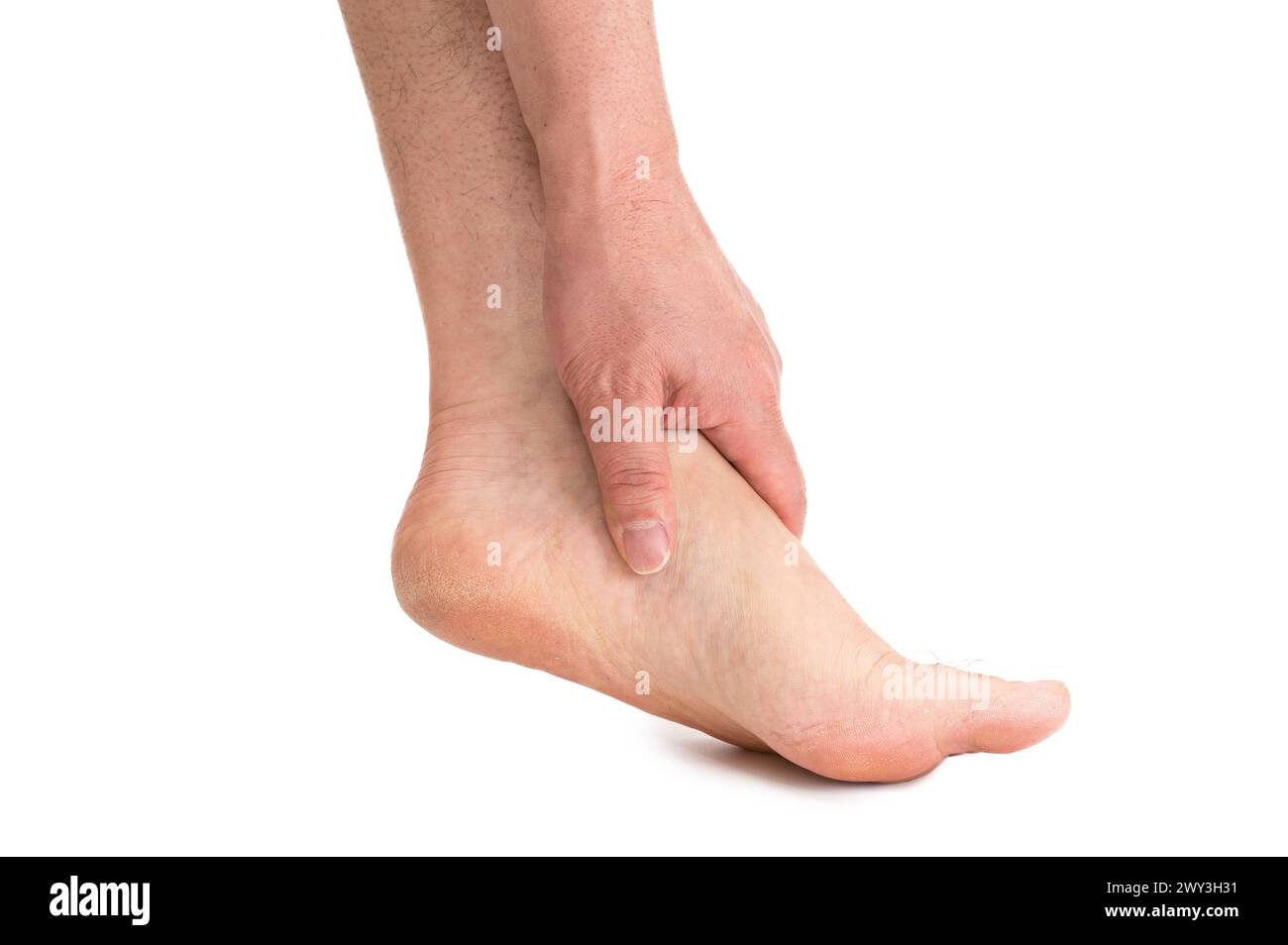 Piede maschio isolato su sfondo bianco Foto Stock