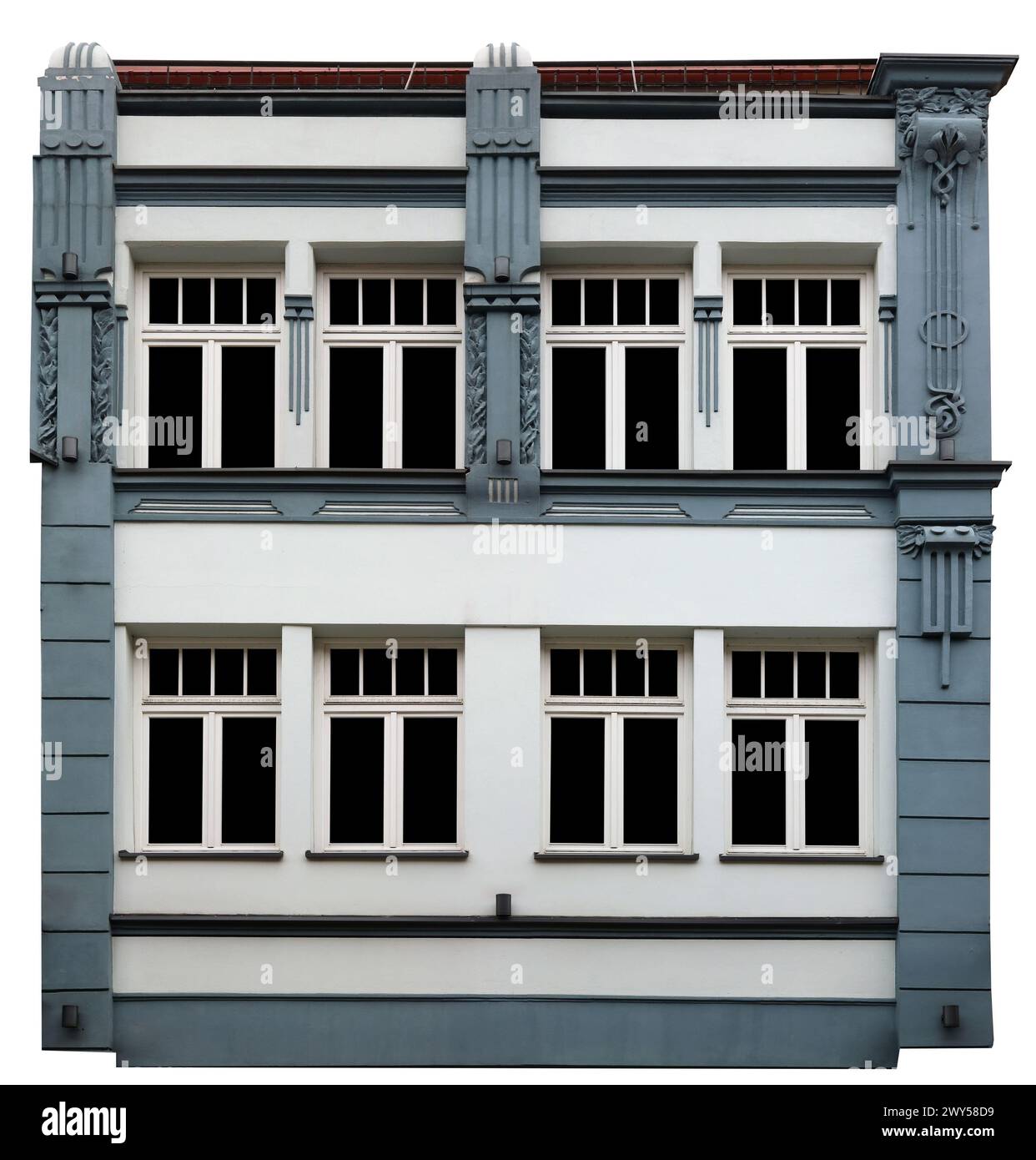 La facciata del vecchio edificio e' decorata con stucchi in gesso. Isolato su bianco Foto Stock