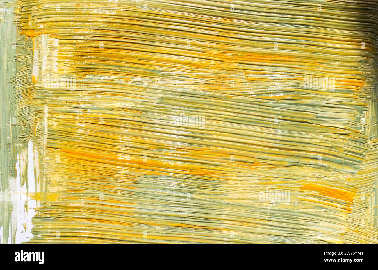 La vernice colorata schizza e pennello su una tela quadrata Foto Stock