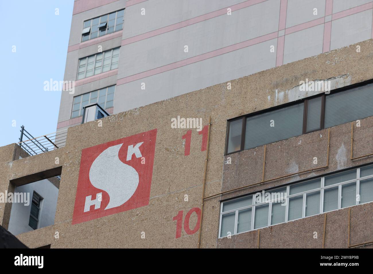 Sun Hung kai Building nella baia di Kowloon, è una delle più importanti agenzie di sviluppo immobiliare e società di gestione immobiliare Foto Stock