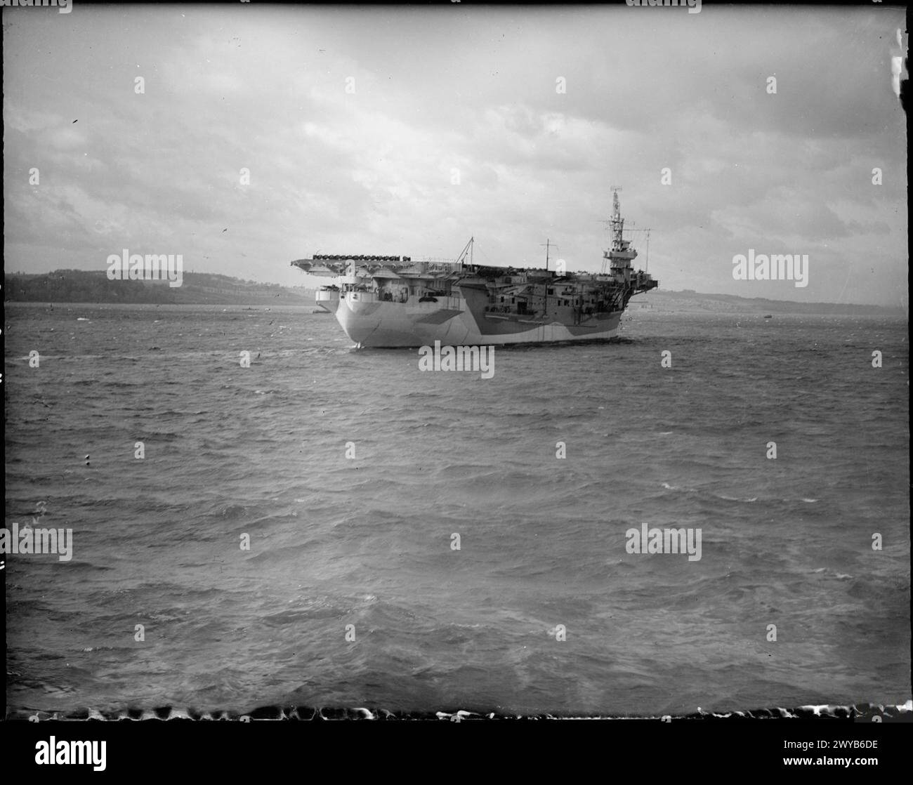 La HMS Khedive (ex Cordova) è in corso nelle acque costiere come nave della Royal Navy. Foto Stock