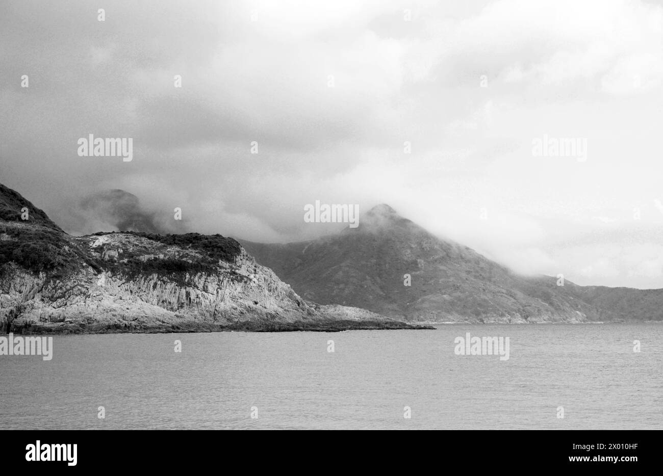 Paesaggi costieri aspre nel parco di campagna di Sai Kung East a Hong Kong. Foto Stock