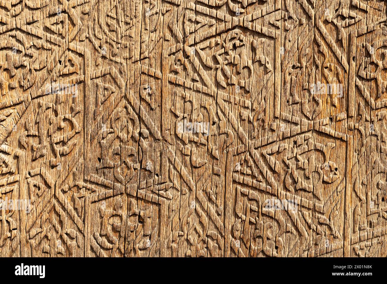 Motivo arabo, primo piano texture di sfondo di un'antica parete di legno Foto Stock