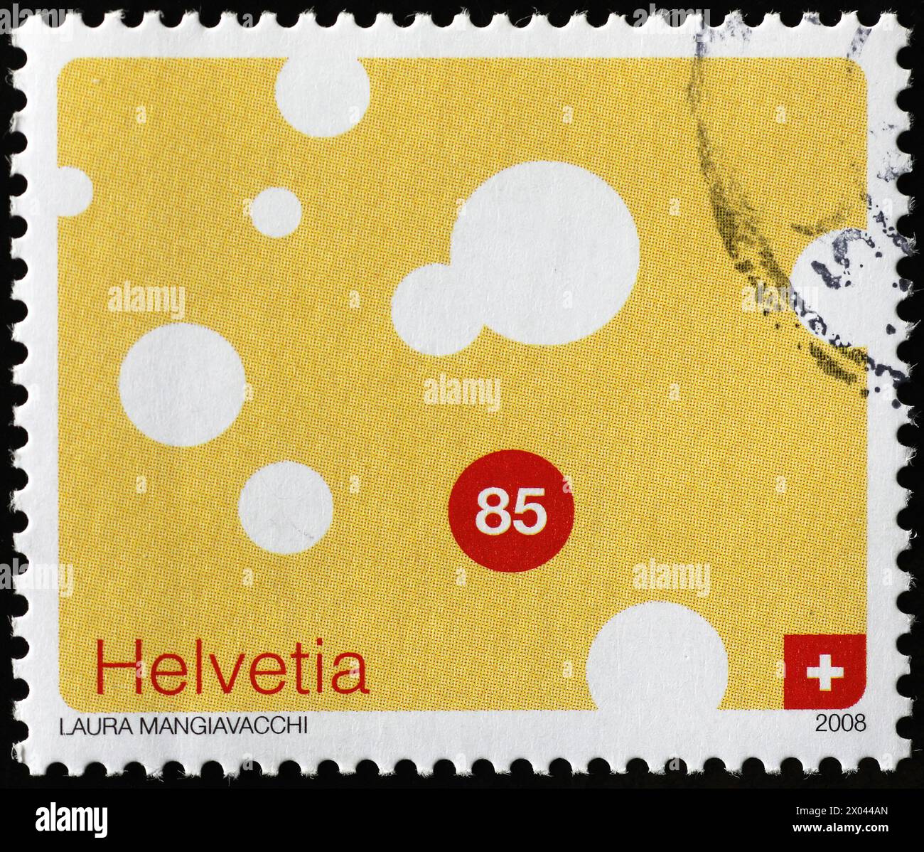 Fetta Emmenthal disegnata su francobollo svizzero Foto Stock