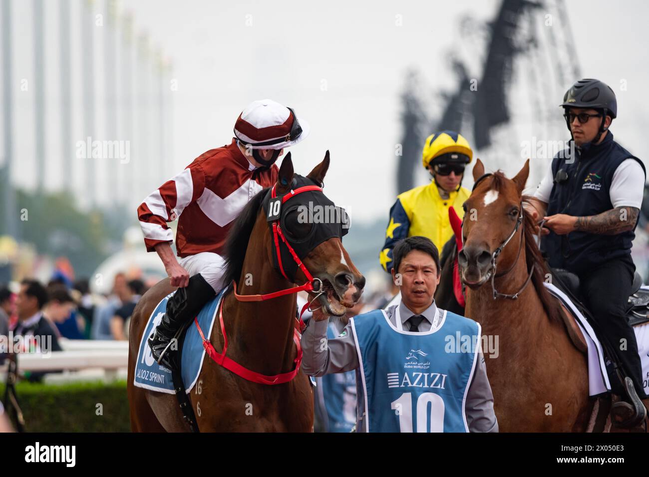 Sight Success e Ryan Moore partono per il G1 al Quoz Sprint, 30/03/24, Meydan Racecourse, Dubai, Emirati Arabi Uniti. Crediti JTW equine Images / Alamy. Foto Stock