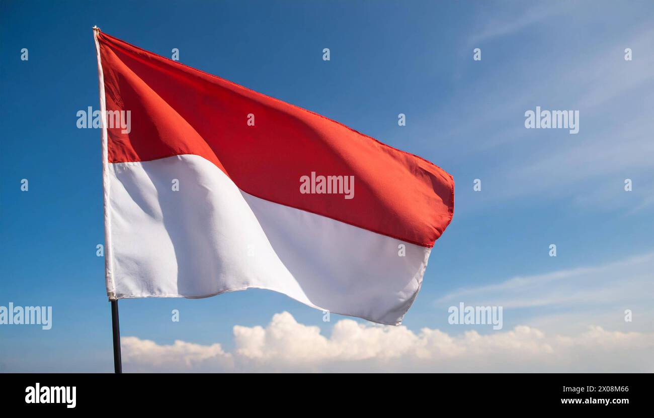 Die Fahne von Indonesien lusinghiero im Wind Foto Stock