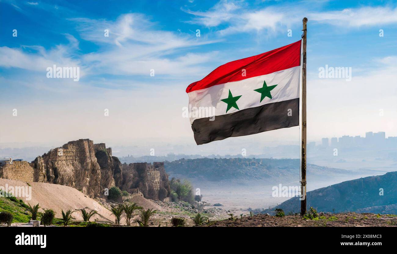 Die Fahne von Syrien flattert im Wind Foto Stock