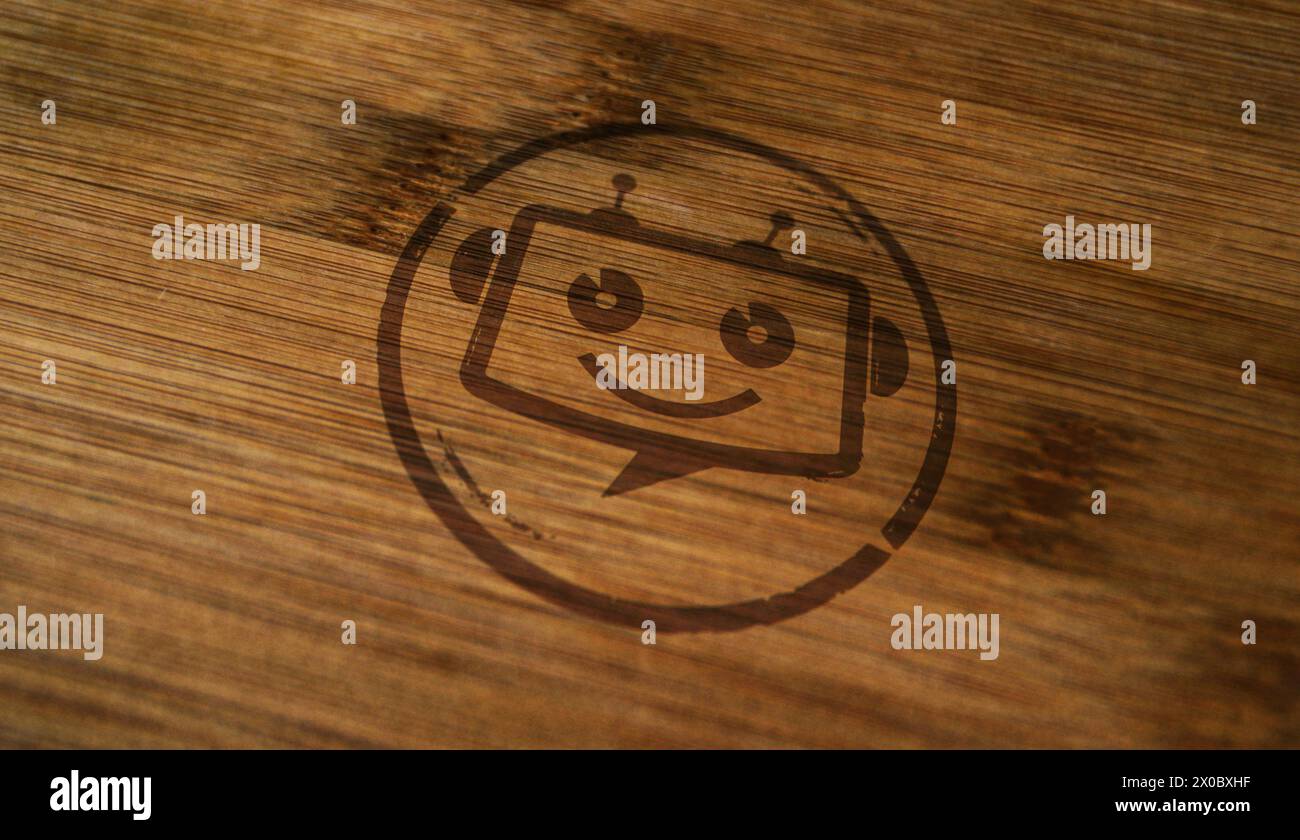 Timbro chatbot ai bot stampato su una scatola di legno. L'intelligenza artificiale supporta il concetto di simboli robot. Foto Stock