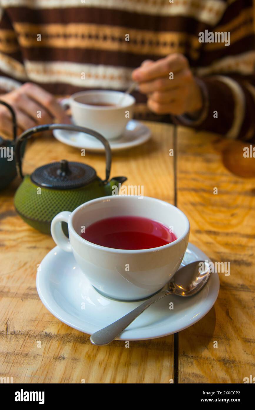 Tazza di tè di frutti di bosco. Foto Stock