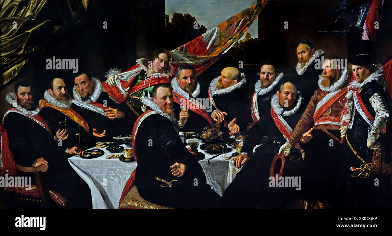 Banchetto degli ufficiali della Guardia Civica di San Giorgio 1616 di Frans Hals, 1582-1666, Anversa- Haarlem, olandese, Paesi Bassi, XVII secolo, secolo d'oro olandese ( St. George Civic Guard. Erano una forza paramilitare volontaria che sorvegliava e proteggeva la città di Haarlem nei Paesi Bassi. (Dipinse vivaci, talvolta anche allegri, ritratti di persone di tutti i livelli della società, persone importanti, bambini cattivi e persino ubriachi o persone dichiarate pazze.) Banchetto degli ufficiali DELLA guardia St George cIIVIC 1616 Foto Stock