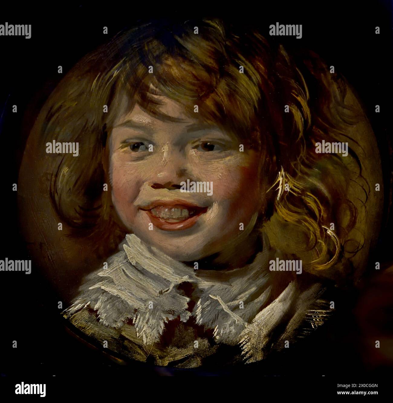 Lachende Jongen - Smiling Boy ( questo ragazzo allegramente ridendo con gli occhi scintillanti e i capelli sbiaditi non è un ritratto, ma una "tronie" - uno studio di un bambino che ride. ) Di Frans Hals, 1582-1666, Anversa- Haarlem, Dutch, Paesi Bassi, XVII secolo, secolo d'oro olandese (dipinse vivaci, talvolta anche allegri, ritratti di persone di tutti i livelli della società, persone importanti, bambini cattivi e persino ubriachi o persone dichiarate pazze). Foto Stock