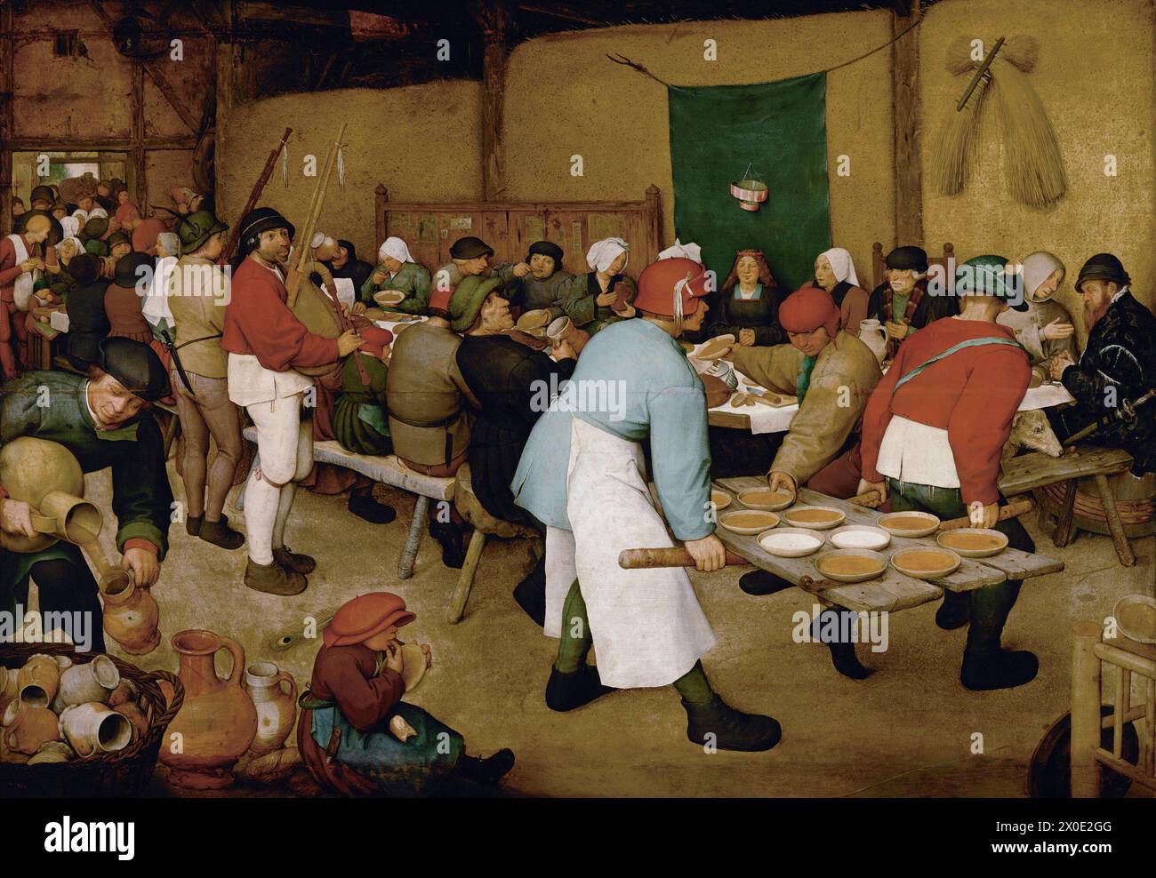 The Peasant Wedding è un dipinto di genere del 1567[1] del pittore e incisore rinascimentale olandese e fiammingo Pieter Bruegel il Vecchio, Foto Stock