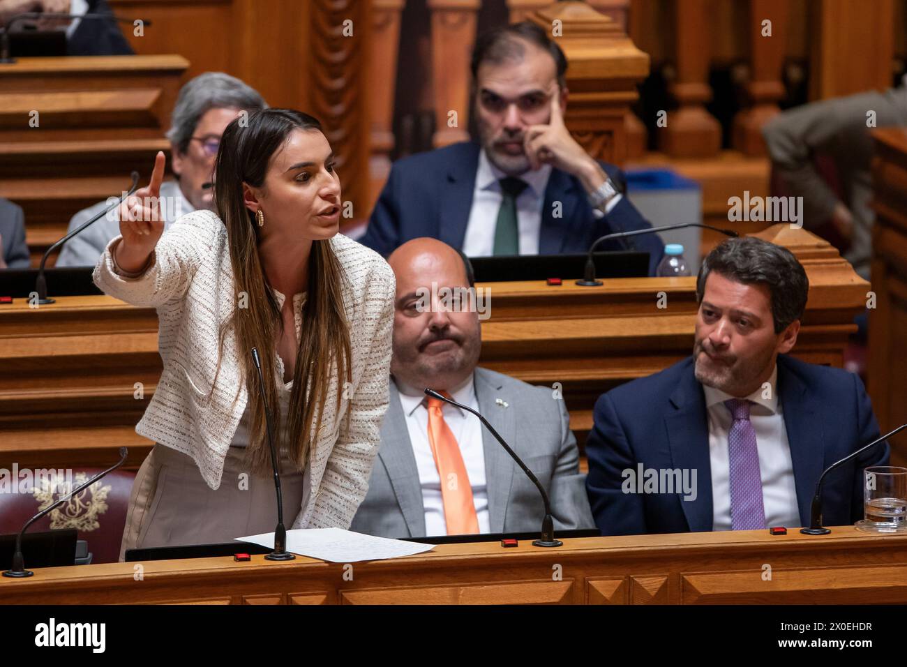 Lisbona, Portogallo. 11 aprile 2024. Rita Matias, deputato del gruppo parlamentare del partito Chega, è presente durante il dibattito sul programma del governo. Il XXIV governo costituzionale del Portogallo, guidato dal primo ministro Luis Montenegro, ha presentato il programma governativo. Il documento è stato discusso dal parlamento portoghese. Credito: SOPA Images Limited/Alamy Live News Foto Stock