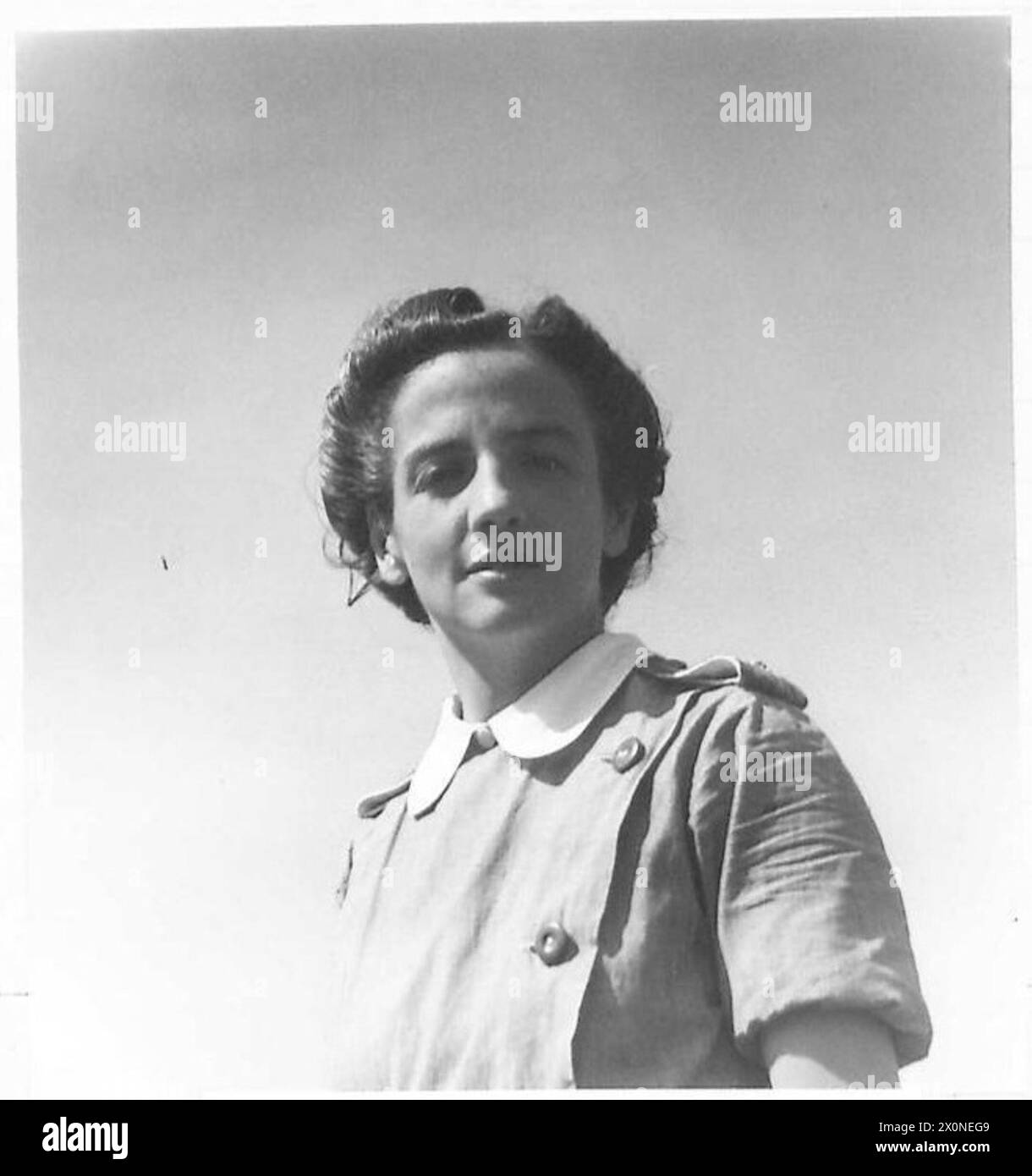 DONNE IN GUERRA - sorella M. Willis in kit teatro (abito sterile e maschera). Negativo fotografico, British Army Foto Stock