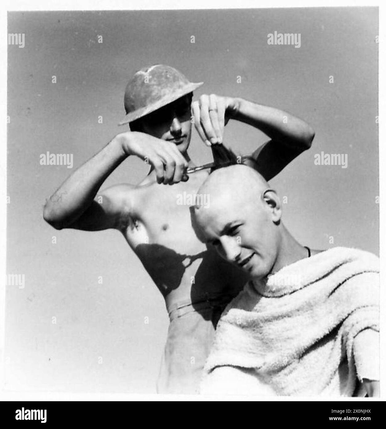 Una rasatura accurata viene mostrata quando la parte finale viene rimossa durante l'attività di cura del corpo o di manutenzione. Foto Stock