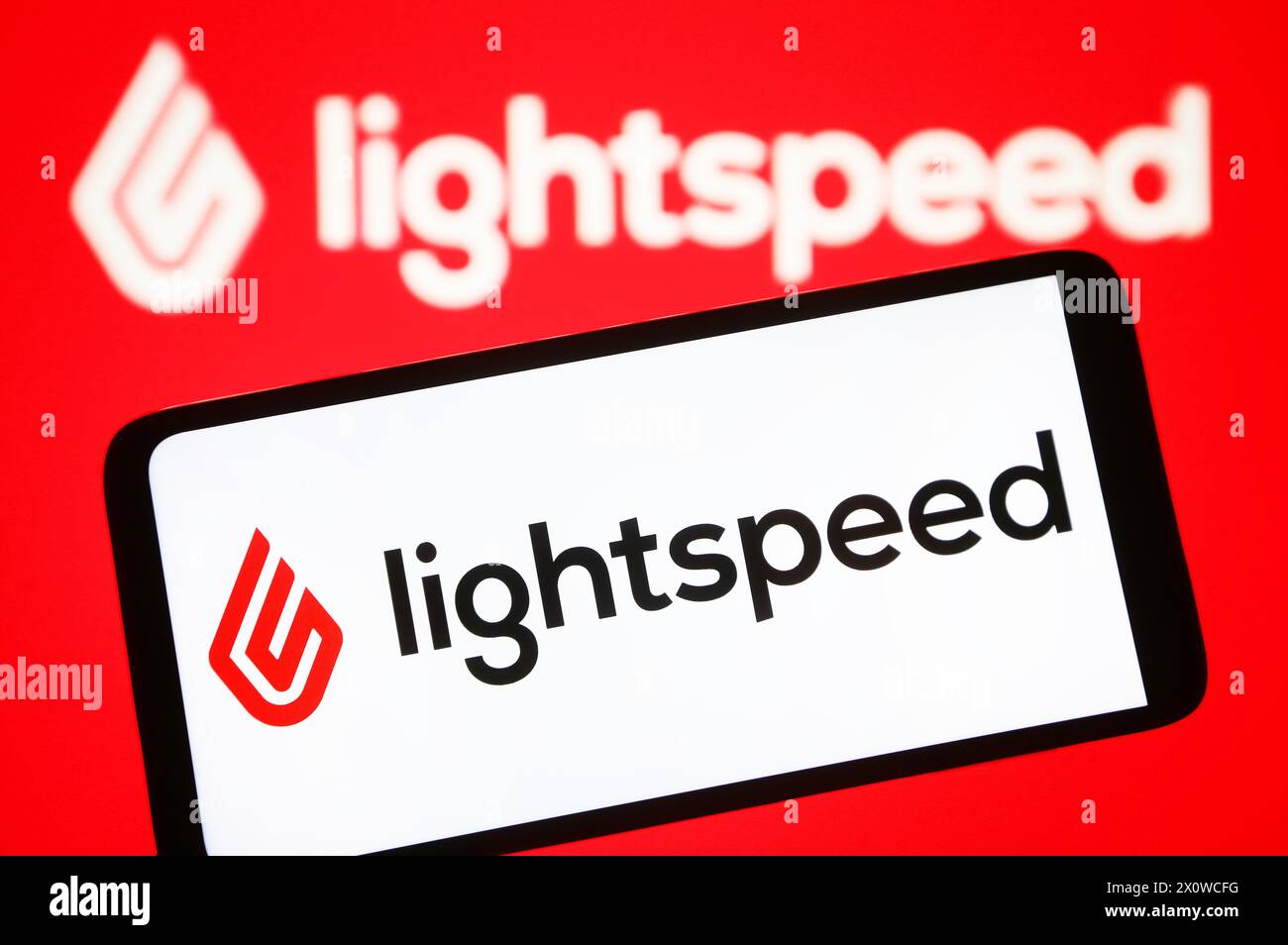 Ucraina. 13 aprile 2024. In questa immagine, il logo LightSpeed Commerce è visibile su uno smartphone e sullo schermo di un pc. (Foto di Pavlo Gonchar/SOPA Images/Sipa USA) *** esclusivamente per notizie editoriali **** credito: SIPA USA/Alamy Live News Foto Stock