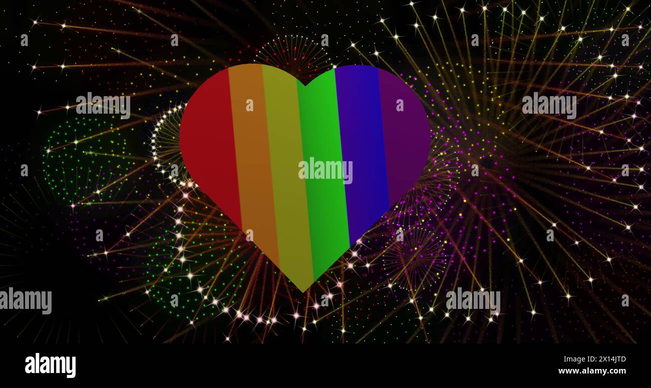 Immagine dell'orgoglio del cuore arcobaleno e fuochi d'artificio che esplodono su sfondo nero Foto Stock