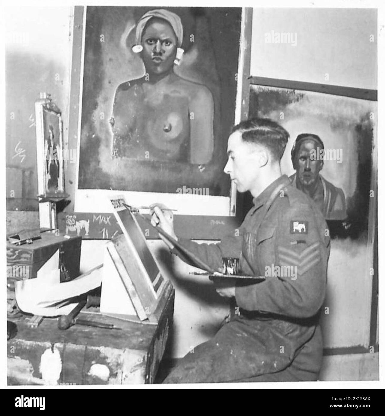 SOLDATO ARTISTA - il sergente Burgess dipinge ritratti nel suo laboratorio durante il pranzo dell'esercito britannico Foto Stock