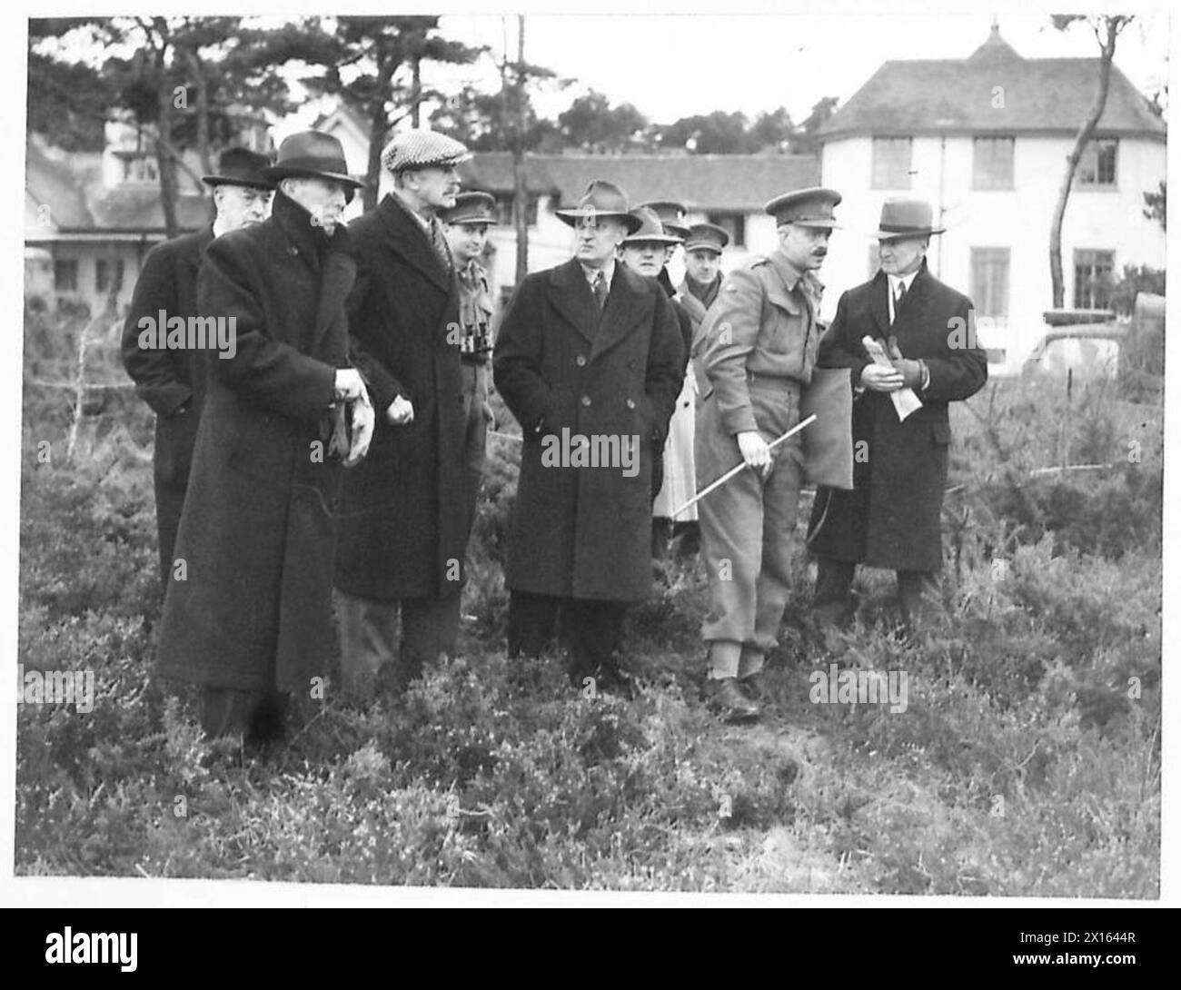 I rappresentanti della Legione americana visitano un'unità dell'esercito britannico, osservando il personale e le operazioni. Foto Stock