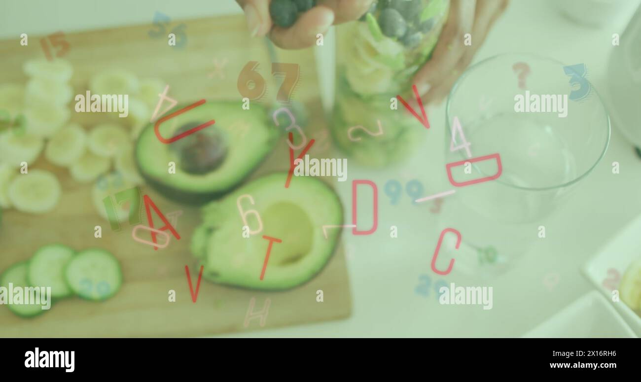 Immagine di lettere e numeri che cadono sopra una donna caucasica che prepara la colazione con le bacche Foto Stock