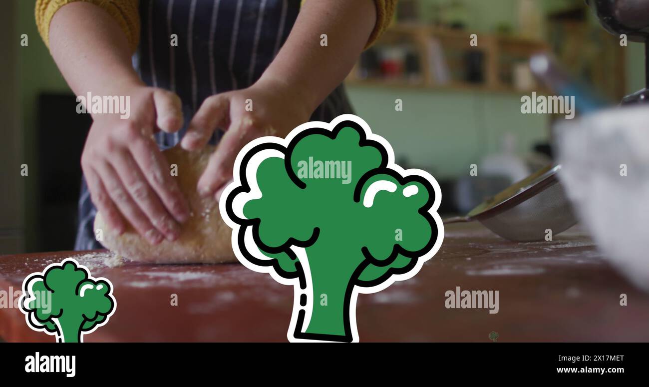 Immagine delle icone dei broccoli sulla cucina della donna caucasica Foto Stock