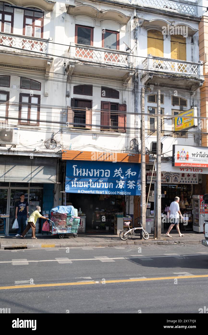"Un cuore allegro è una buona medicina" Bangkok Thailandia Foto Stock