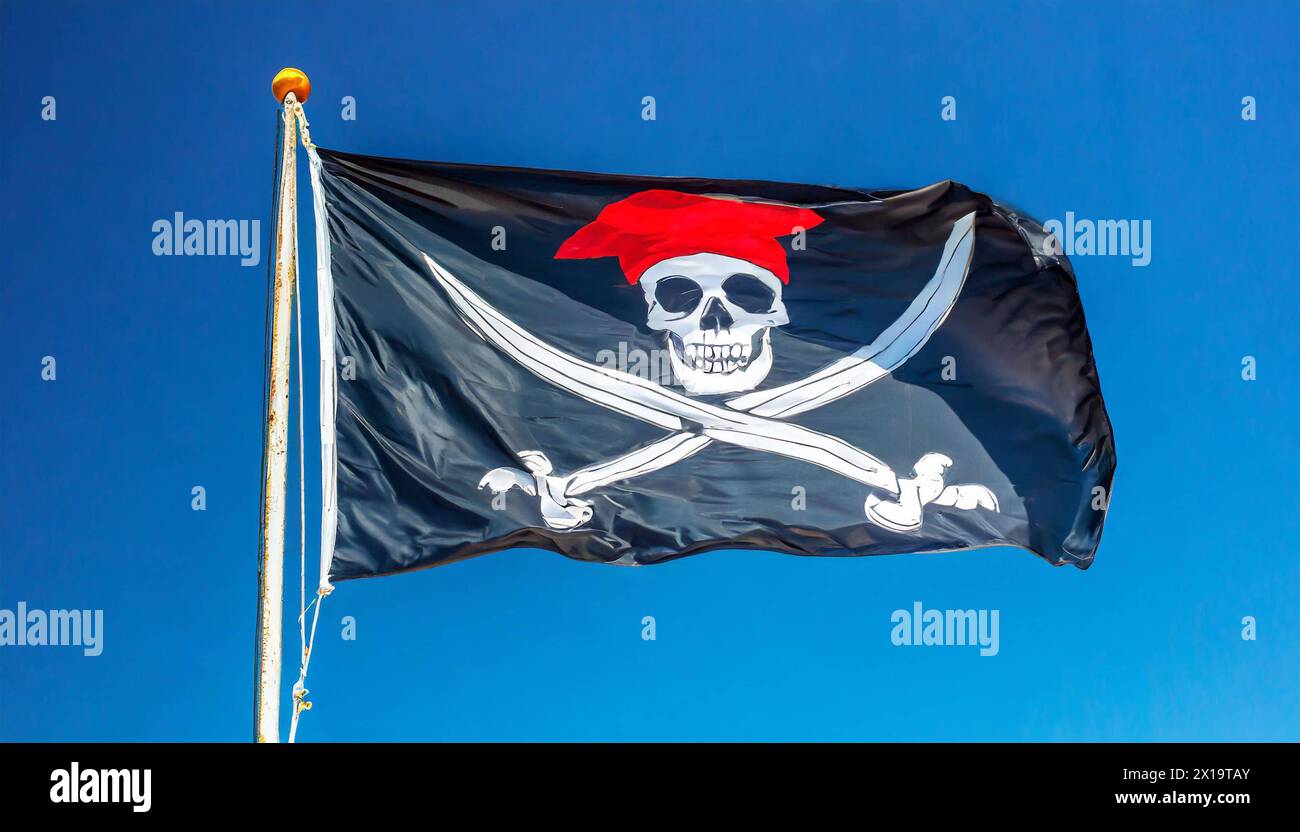 Die Piratenflagge flattert im Wind, isoliert, gegen den blauen Himmel Foto Stock