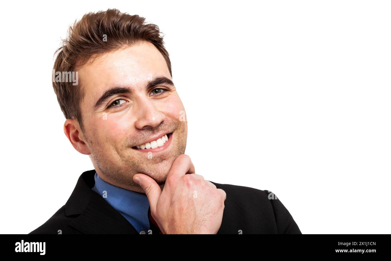 Ritratto di un allegro giovane uomo d'affari caucasico adulto che indossa un abbigliamento elegante e informale. Trasudando fiducia e ottimismo. Con un felice e satis Foto Stock
