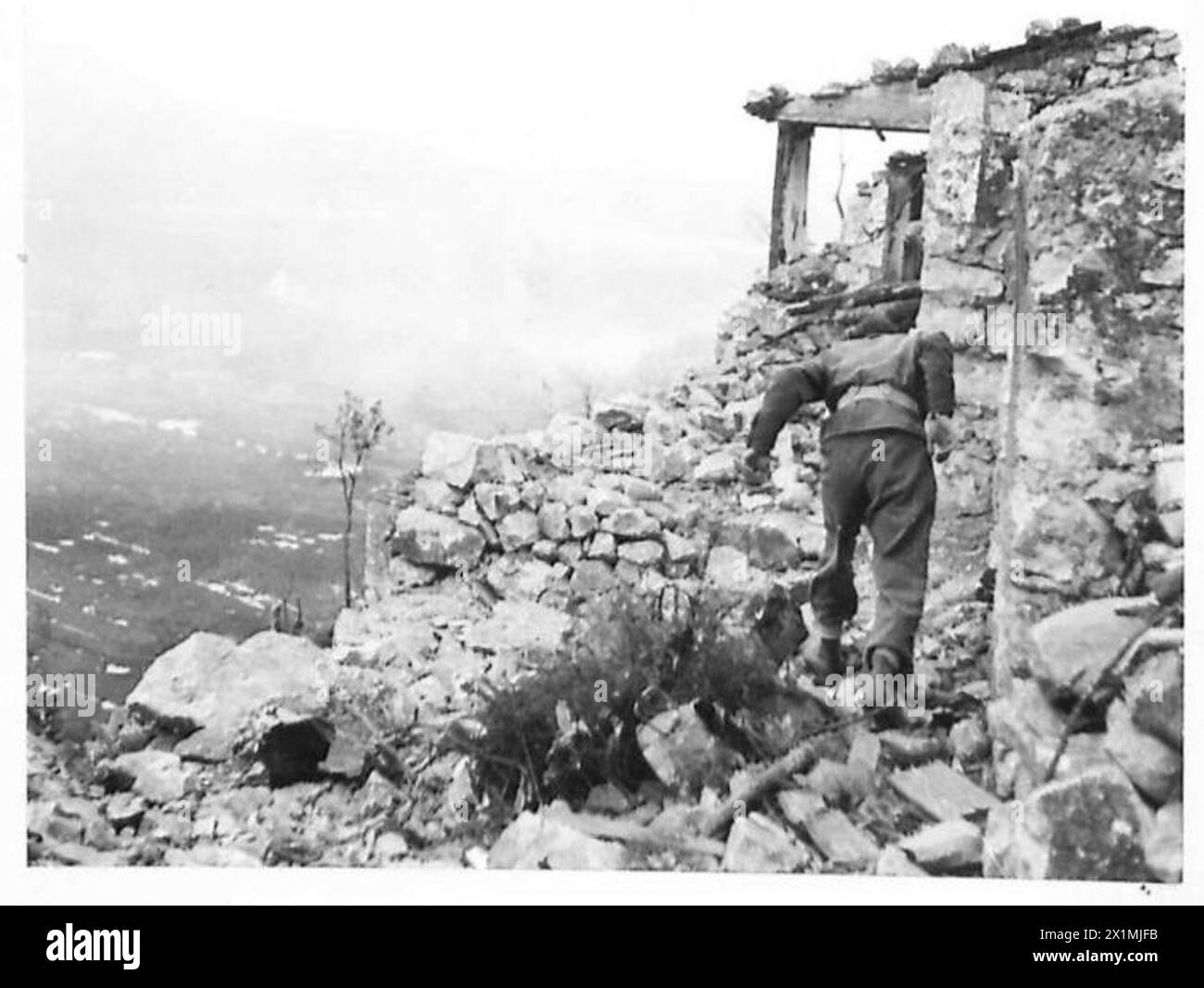 Durante la battaglia di Cassino e Monastery Hill, la fanteria neozelandese avanzò attraverso la città utilizzando case in rovina per coprire le operazioni dell'esercito britannico. Foto Stock