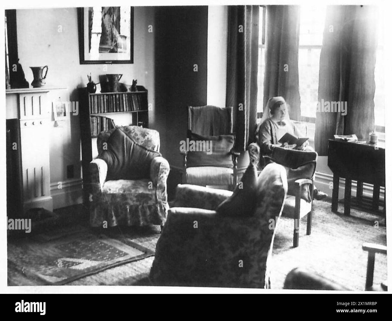 Interno di un salotto dell'ostello per le mogli dei soldati gestito dall'esercito britannico, che fornisce alloggio e servizi di supporto. Foto Stock