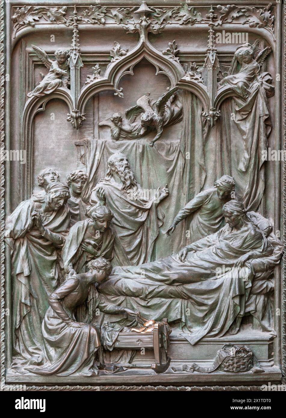 MILANO, ITALIA - 16 SETTEMBRE 2024: Il dettaglio dalla porta principale in bronzo del Duomo - Natività di San Giovanni Battista - di Ludovico Pogliaghi (19 Foto Stock