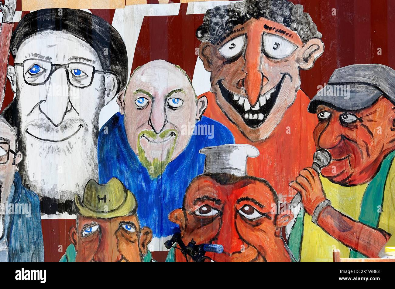 Bazar d'arte di Marsiglia, pittura murale con caricature colorate di varie espressioni facciali, Marsiglia, Bouches-du-Rhone del dipartimento Foto Stock