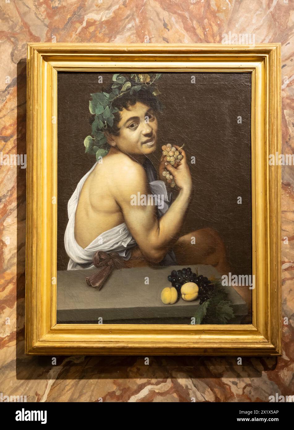 Roma, Italia - 28 dicembre 2023: Autoritratto come il Bacco malato di Caravaggio, 1593 - olio su tela - Galleria Borghese Foto Stock