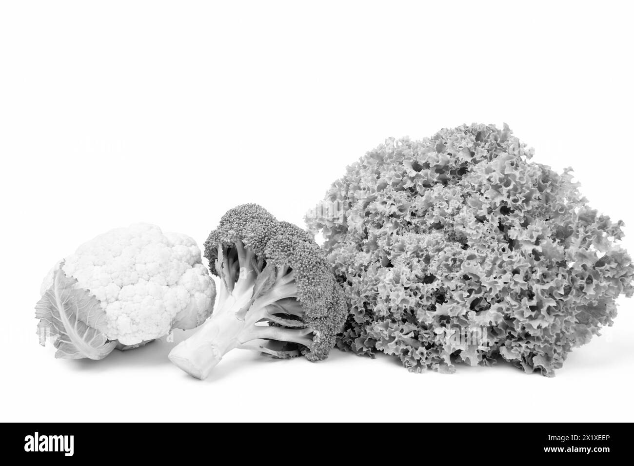 Varietà di verdure biologiche broccoli e cavolfiore teste di cavolo e lattuga isolato su bianco Foto Stock