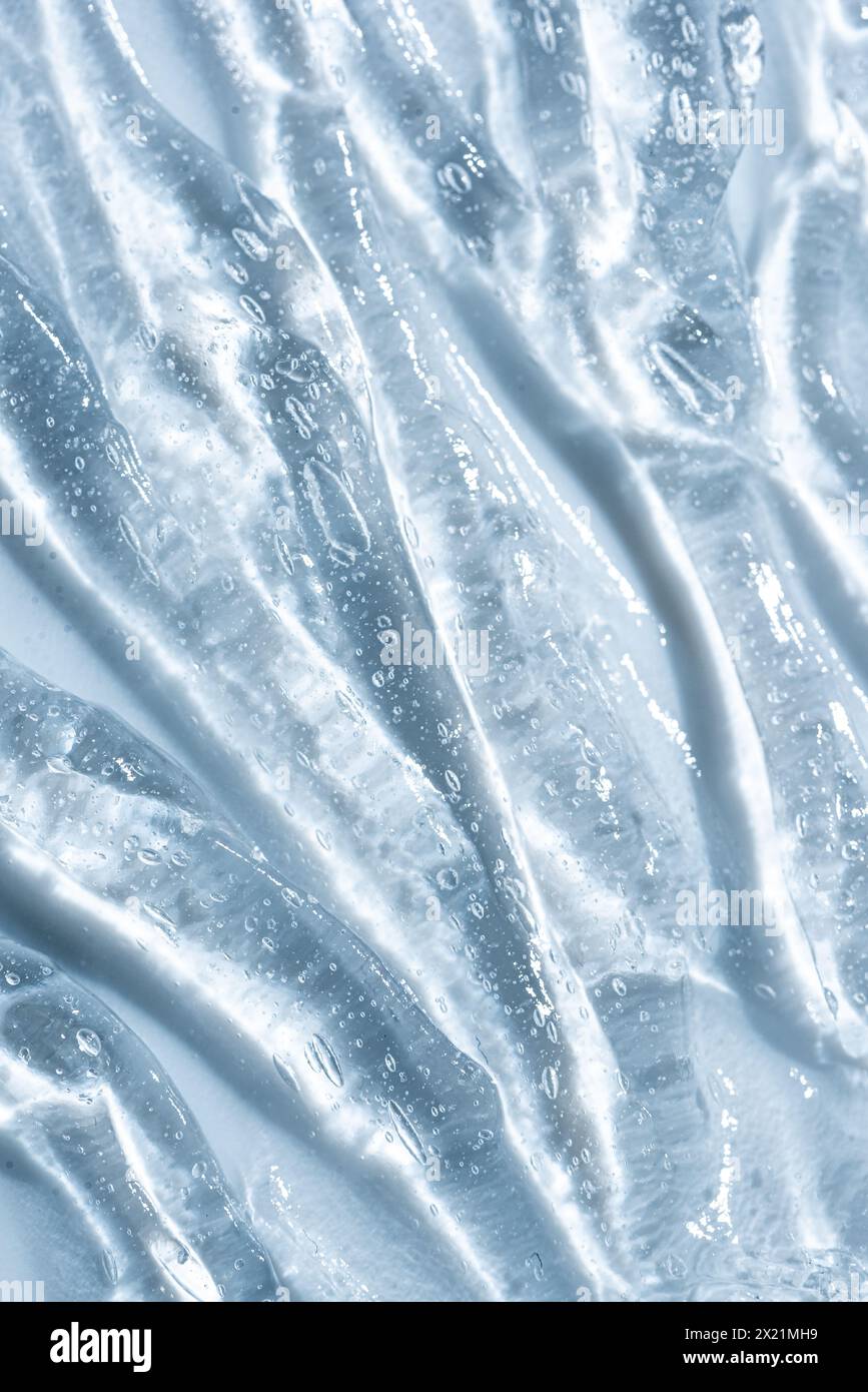 Acido ialuronico o gel di colagene per l'idratazione della pelle. Gel cosmetico per massaggio anti-età. Primo piano sulla consistenza del gel di collagene. Foto Stock