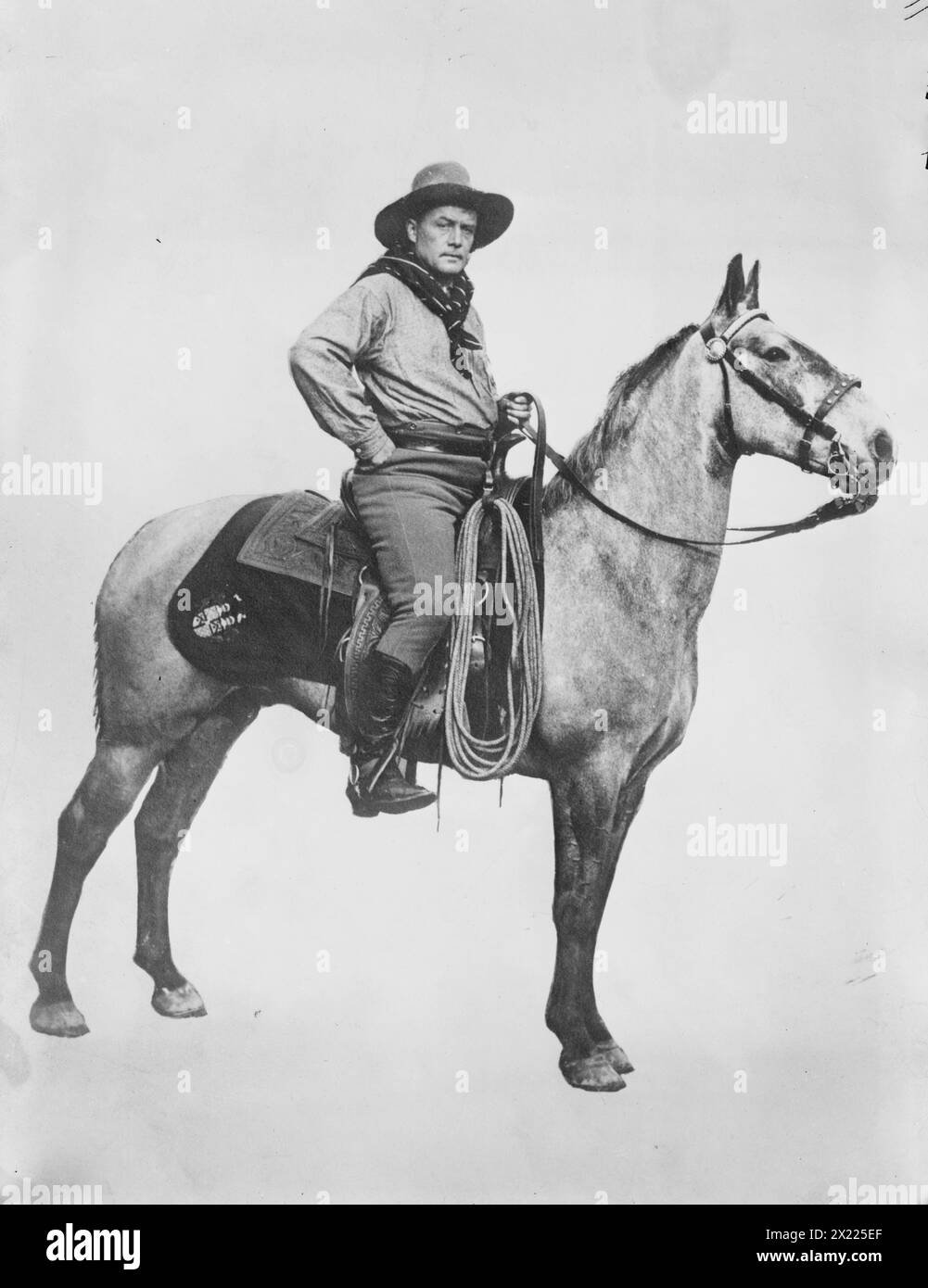 Sir Genille Cave Brown Cave, 1911. Mostra il cowboy e il barman Sir Genille Cave-Brown-Cave, XII baronetto (1869-1929). Foto Stock